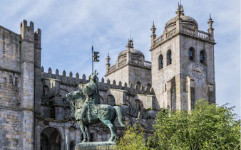 Porto Cathedral with equestrian statue in Old Town, Portugal.