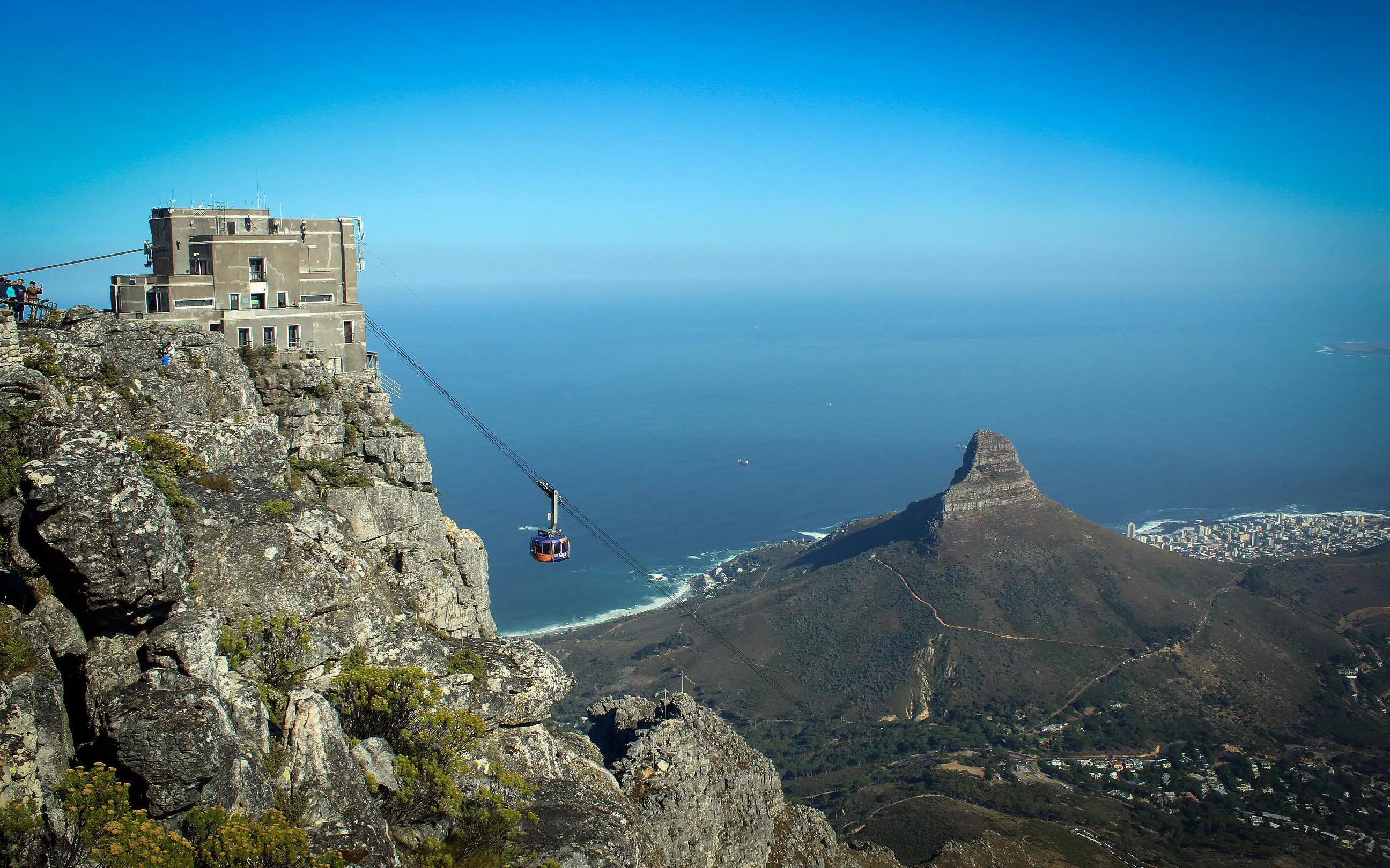 Cable car station atop Table Mountain with view of Lion's Head, Cape Town, South Africa.