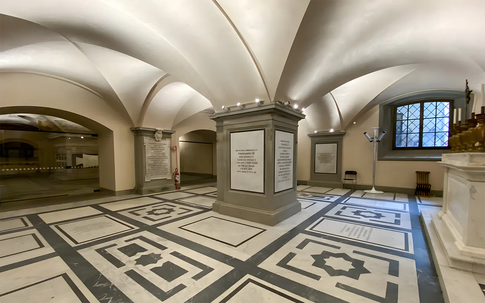 Interior of Medici Chapel with ornate marble floor and vaulted ceiling, Florence, Italy.