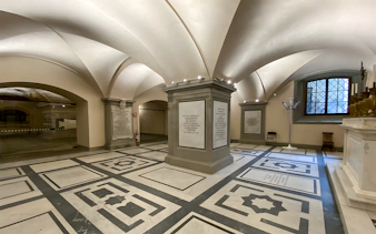 Interior of Medici Chapel with ornate marble floor and vaulted ceiling, Florence, Italy.