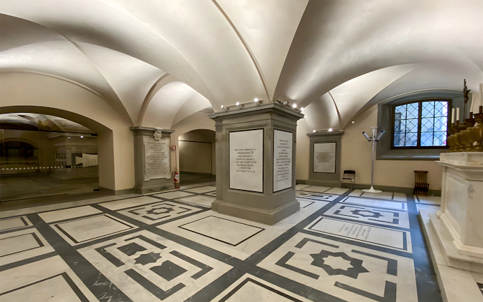 Interior of Medici Chapel with ornate marble floor and vaulted ceiling, Florence, Italy.