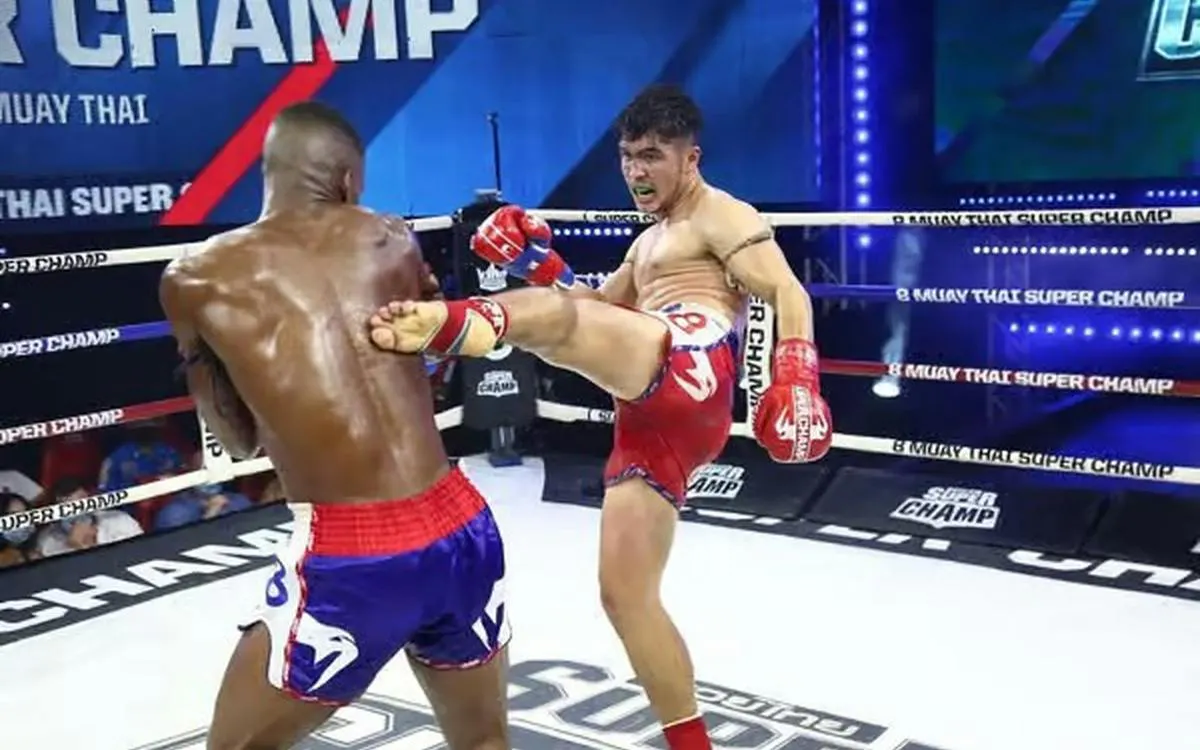 Muay Thai fighters in action at Patong Boxing Stadium, Phuket.