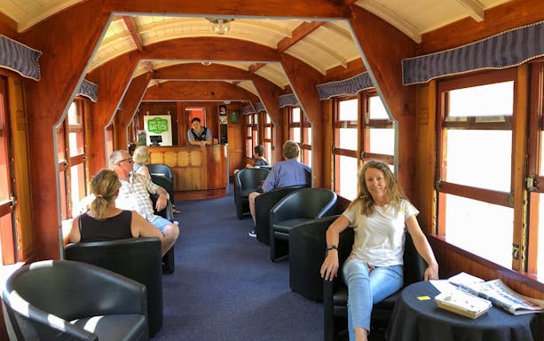 VIP passengers relaxing in the Mary Valley Rattler train club car.