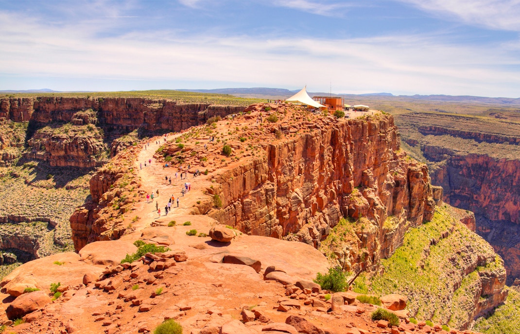 Helicopter flying over Guano Point at Grand Canyon's West Rim