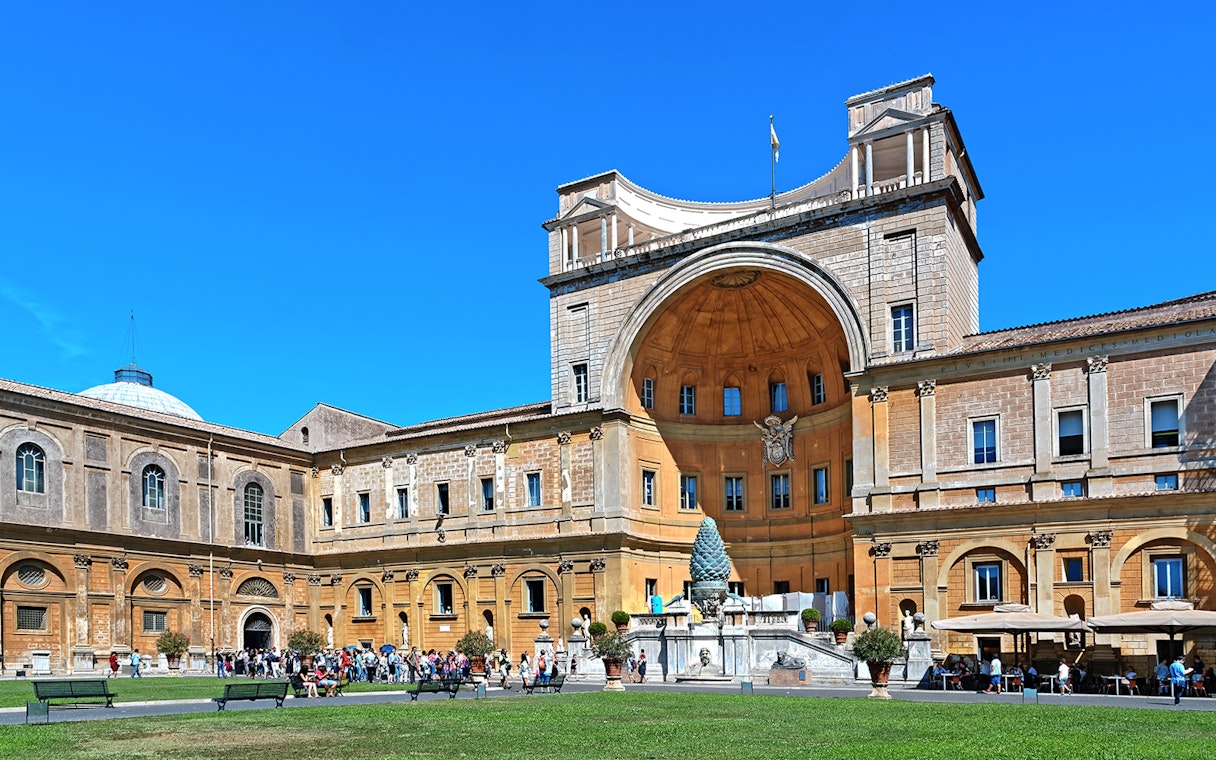 Belvedere Courtyard in Vatican City with tourists and architectural details.