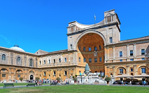 Belvedere Courtyard in Vatican City with tourists and architectural details.