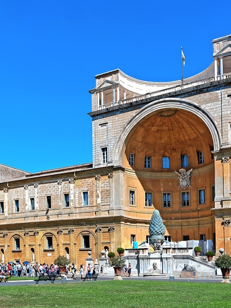Belvedere Courtyard in Vatican City with tourists and architectural details.