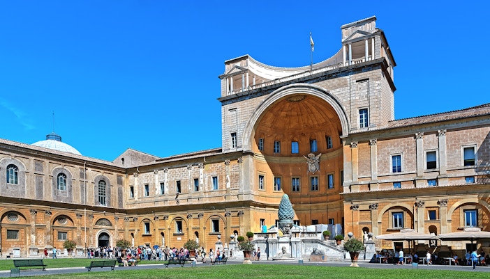 Belvedere Courtyard in Vatican City with tourists and architectural details.
