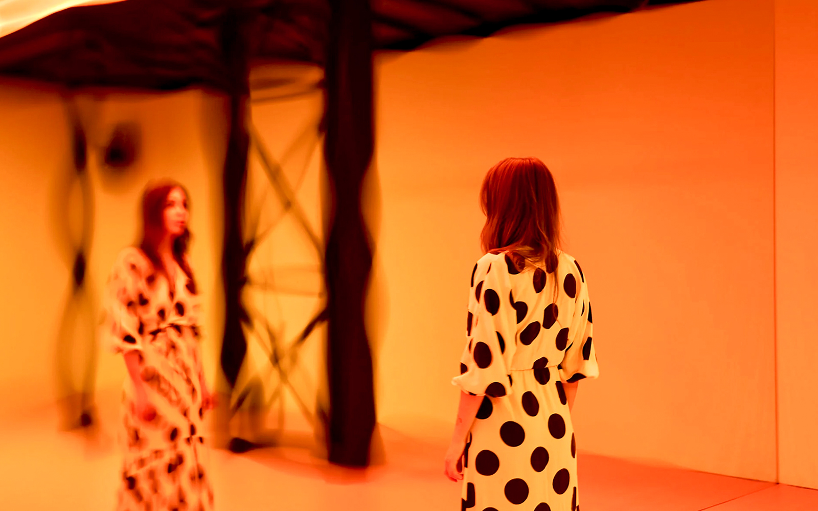 Guest viewing light installation at Light Art Museum exhibit.