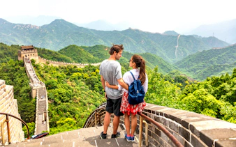 Tourists enjoying the view on the Great Wall of China near Beijing.
