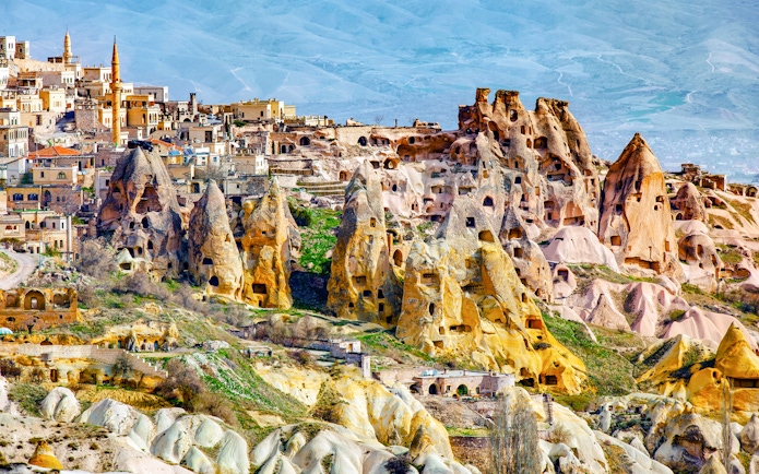 Fairy chimneys and ancient cave dwellings in Cappadocia, Turkey.