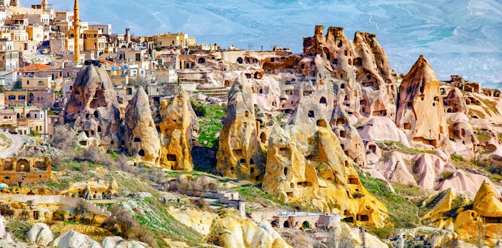 Fairy chimneys and ancient cave dwellings in Cappadocia, Turkey.