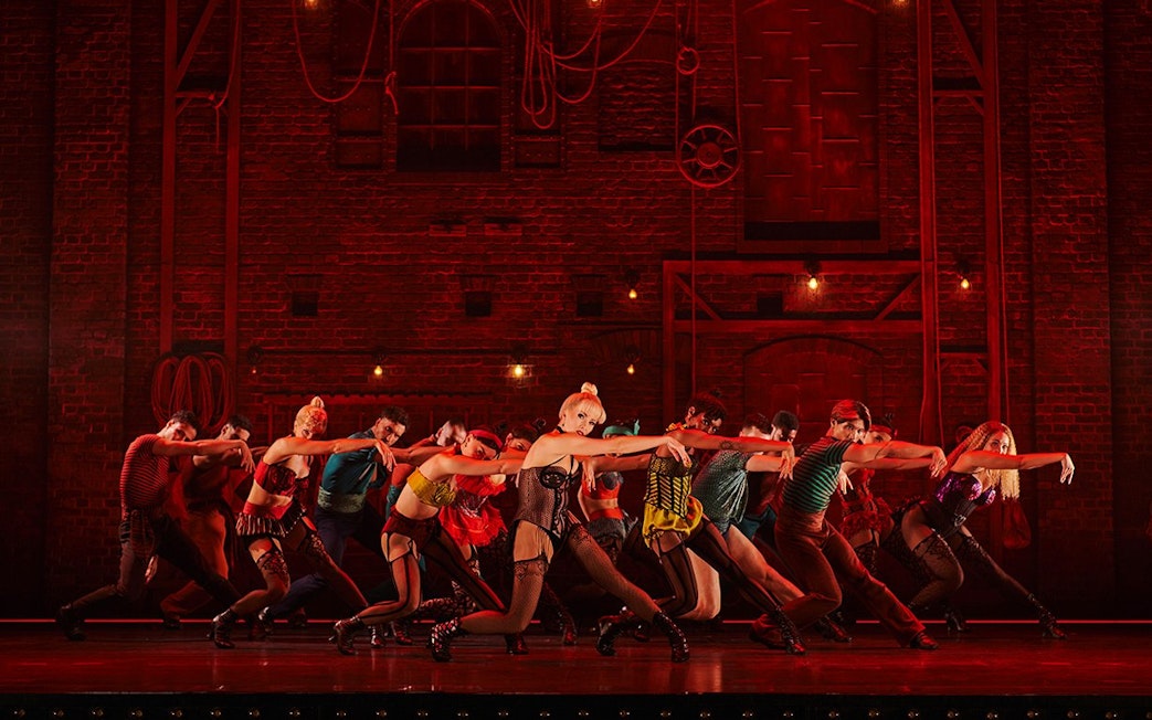 Performers dancing on stage during Come Alive Westend show.