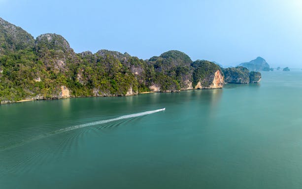 Canoe on Phang Bay with limestone cliffs, Phuket tour.