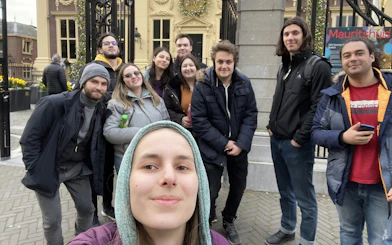 Group of people in front of Mauritshuis museum in The Hague during a self-guided city exploration game.