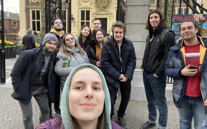 Group of people in front of Mauritshuis museum in The Hague during a self-guided city exploration game.