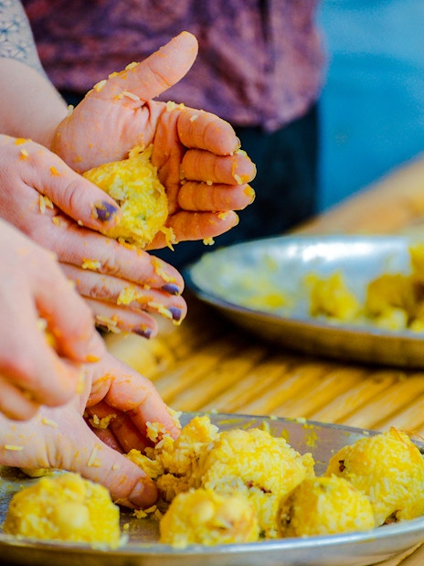 People preparing food at Lily Elephant Camp, Phuket.