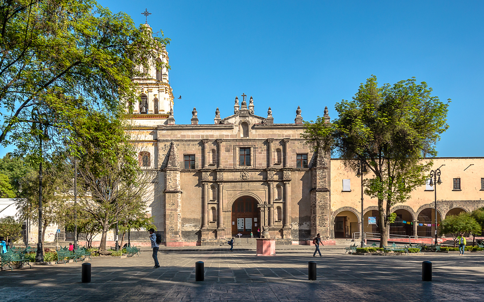 San Juan Bautista Parish facade with bell towers in Coyoacan, Mexico.