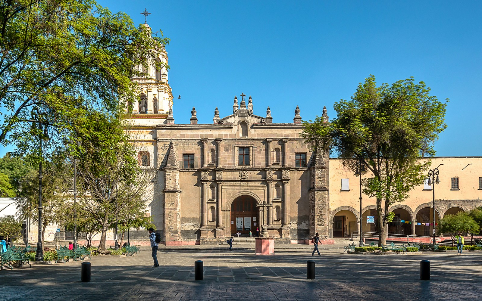 San Juan Bautista Parish facade with bell towers in Coyoacan, Mexico.