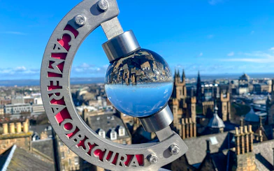Globe exhibit reflecting Edinburgh skyline at Camera Obscura & World of Illusions.
