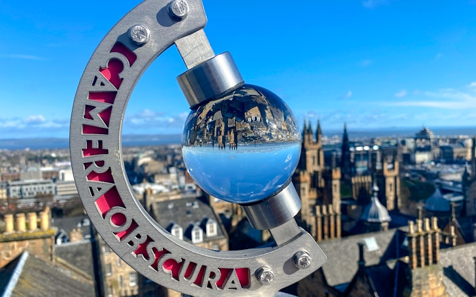 Globe exhibit reflecting Edinburgh skyline at Camera Obscura & World of Illusions.
