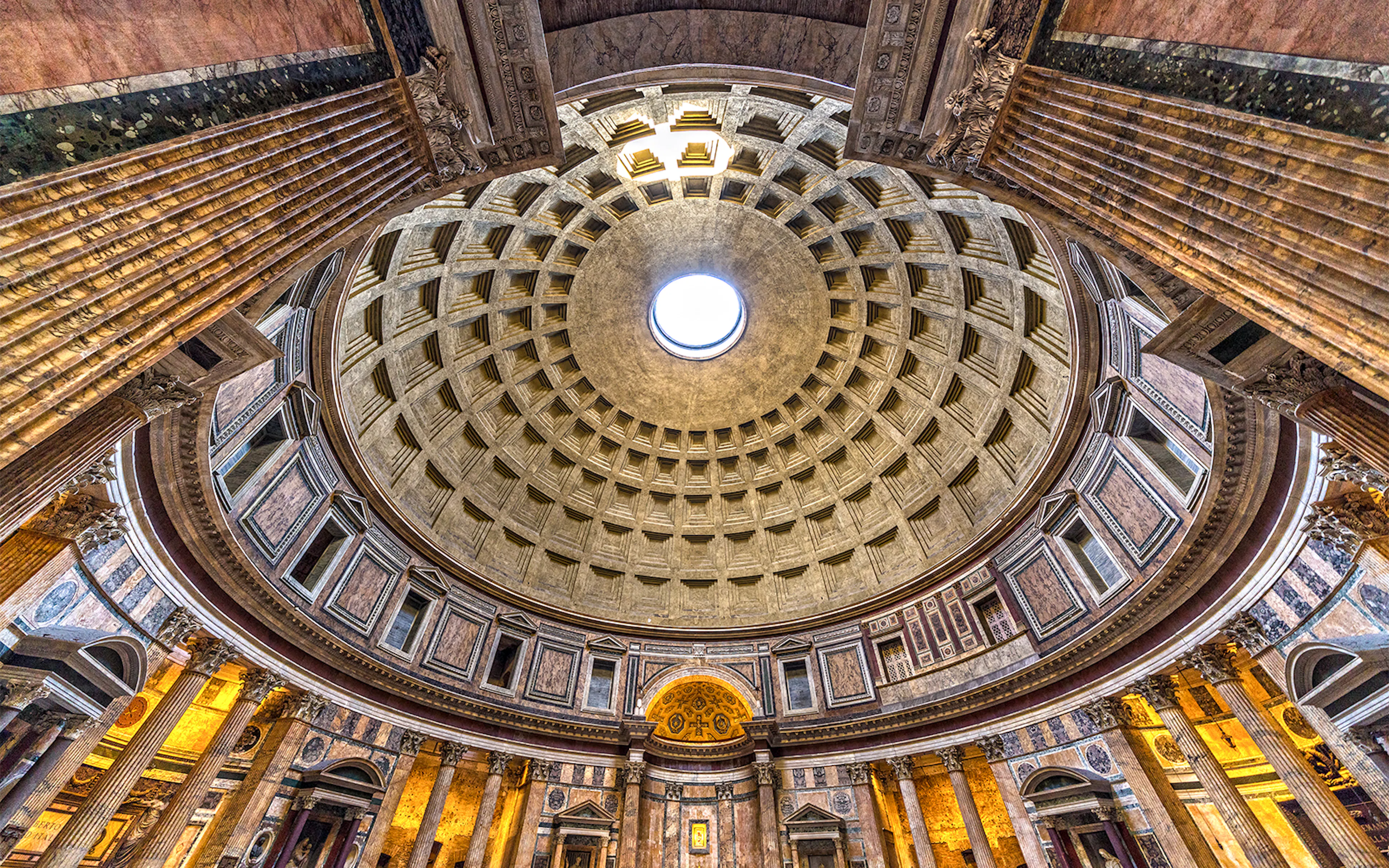 Coffered concrete dome and central oculus inside the Roman Pantheon.