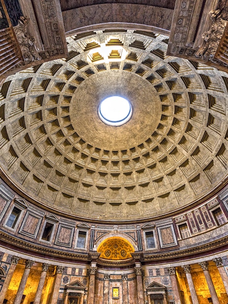 Roman Pantheon dome with oculus and coffered ceiling in Rome, Italy.
