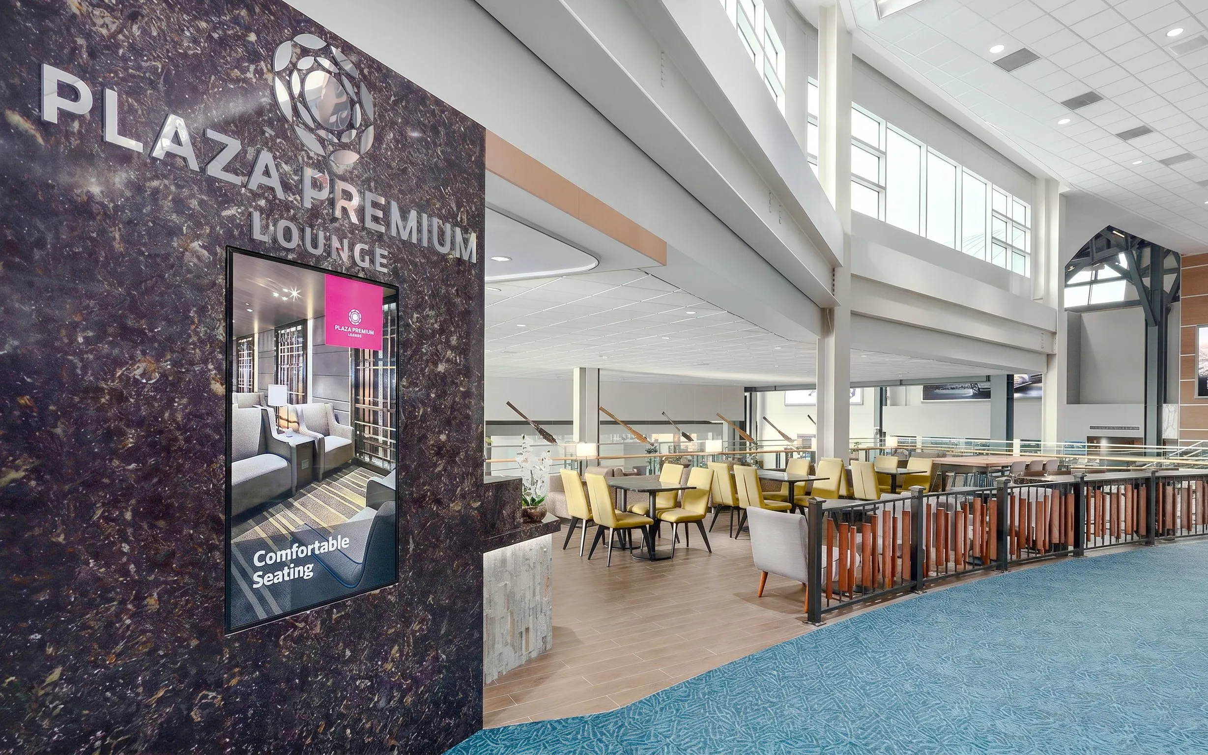 Plaza Premium Lounge seating area at Vancouver International Airport's domestic departures, Pier C.