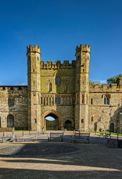 Battle Abbey gatehouse with stone towers in East Sussex, England.
