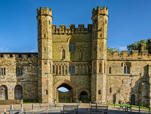 Battle Abbey gatehouse with stone towers in East Sussex, England.