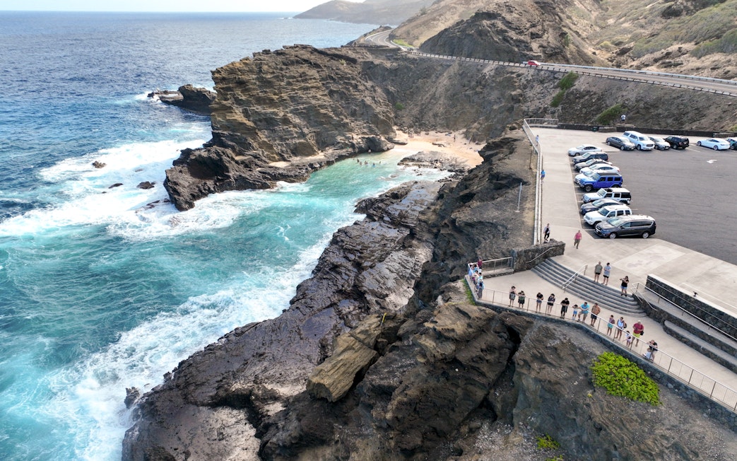 Aerial view of Halona Beach Cove and Halona Blowhole with visitors, Oahu, Hawaii.