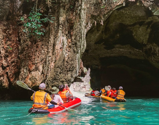 Kayakers explore limestone caves