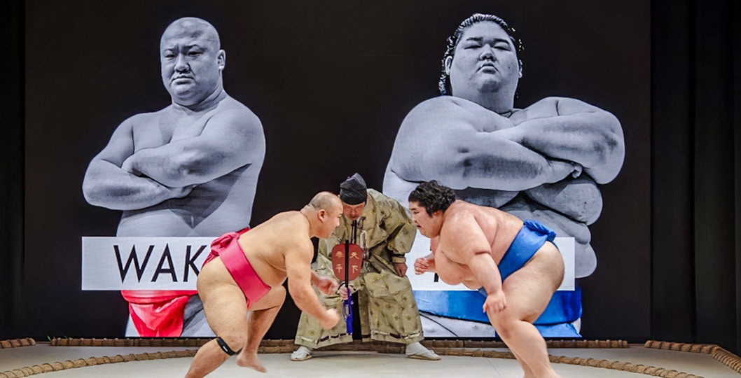 Sumo wrestlers competing at The Sumo Hall Hirakuza in Osaka.