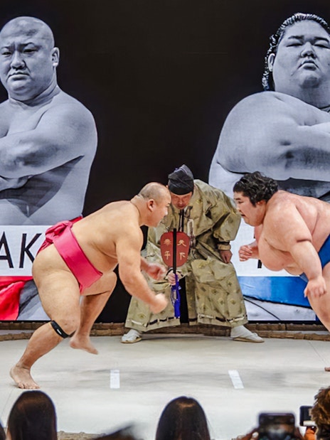 Sumo wrestlers competing at The Sumo Hall Hirakuza in Osaka.