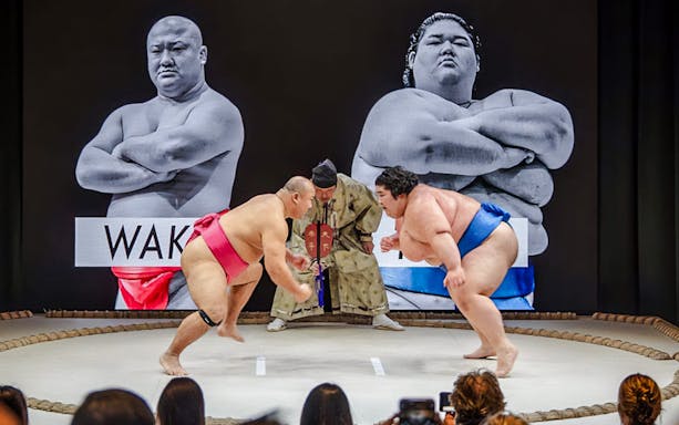 Sumo wrestlers competing at The Sumo Hall Hirakuza in Osaka.