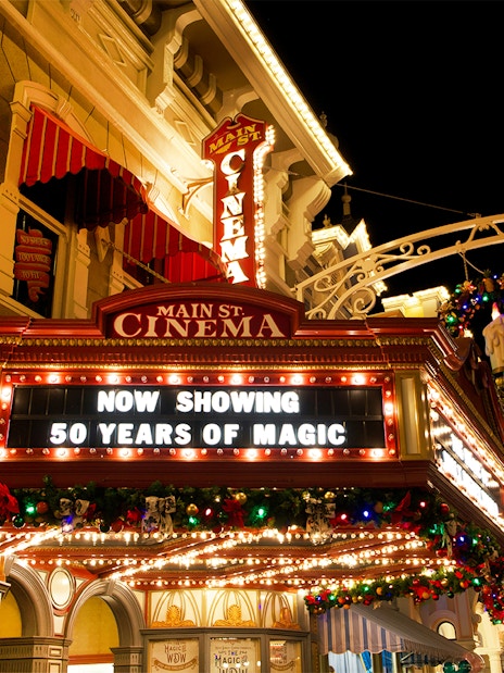 Main Street Cinema marquee at Walt Disney World Orlando, displaying "50 Years of Magic" sign.
