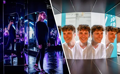 Guests exploring mirror illusions at the Museum of Illusions Amsterdam.