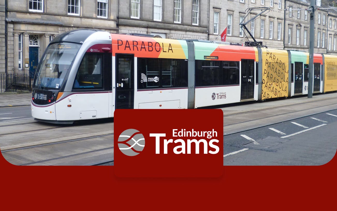 Edinburgh tram on city street, part of round-trip service to/from Edinburgh Airport.