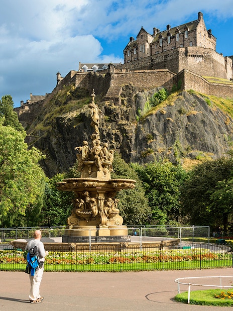 Princes Street Gardens with view of Edinburgh Castle, part of Glenfinnan, Glencoe, and Fort William tour.