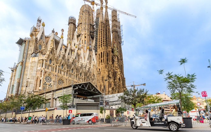 Tuk tuk in front of Sagrada Familia, Barcelona.