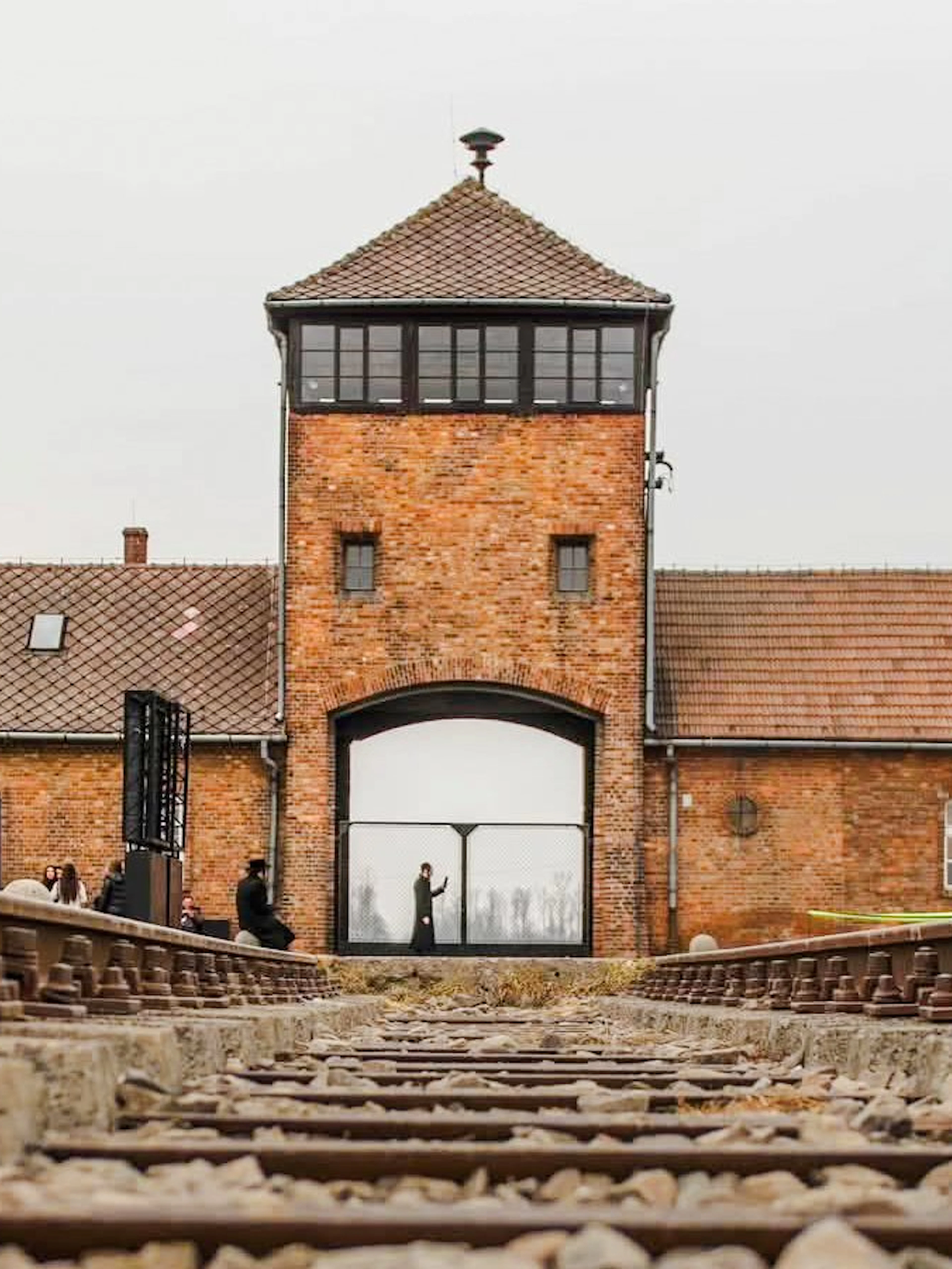 Rail tracks leading to the Gate of Death at Auschwitz II concentration camp.