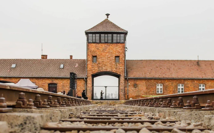 Rail tracks leading to the Gate of Death at Auschwitz II concentration camp.