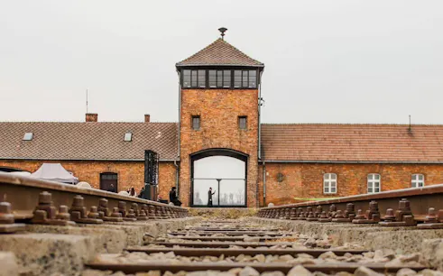 Rail tracks leading to the Gate of Death at Auschwitz II concentration camp.