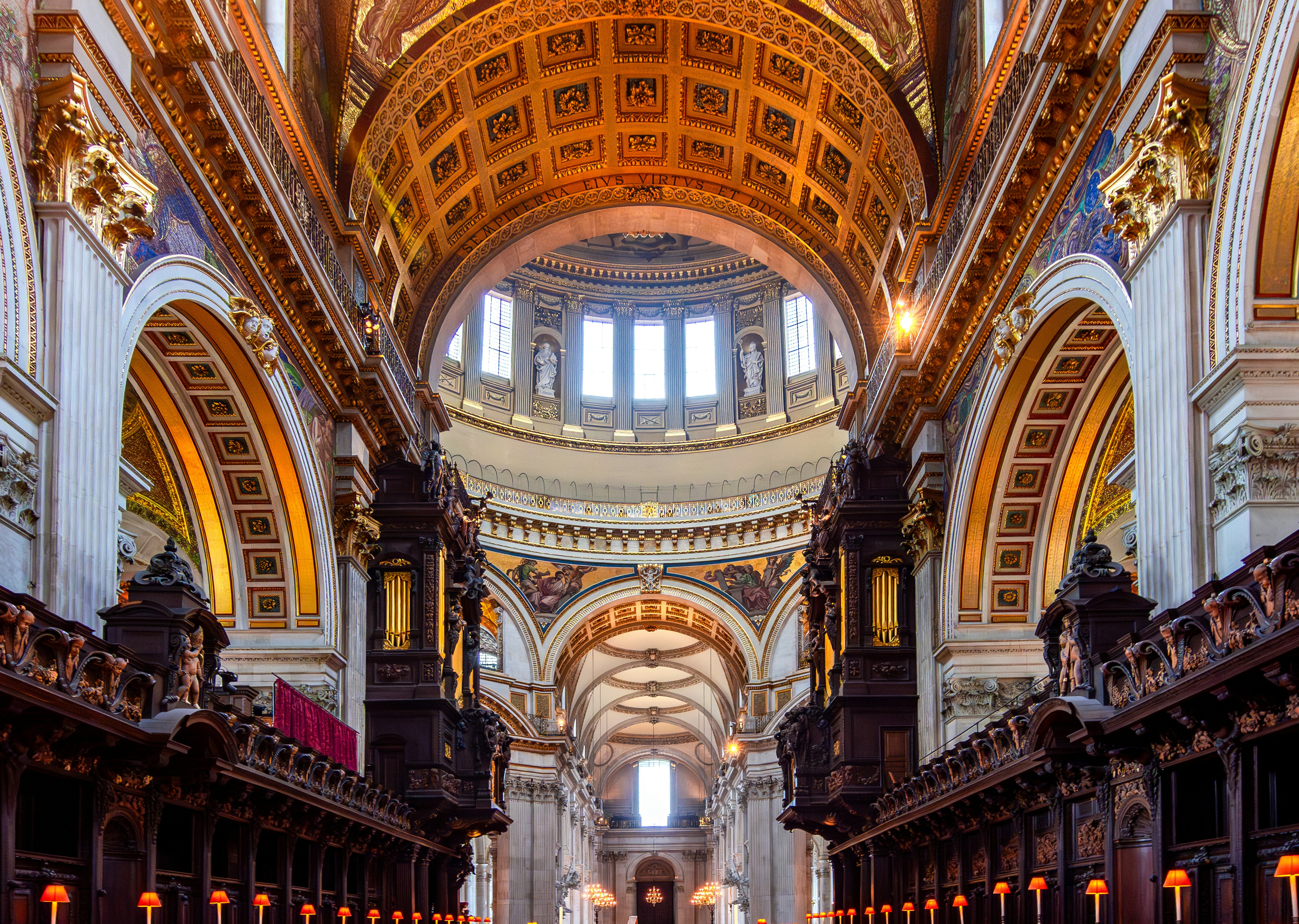 St Paul's Cathedral quire interior with ornate arches and detailed ceiling.