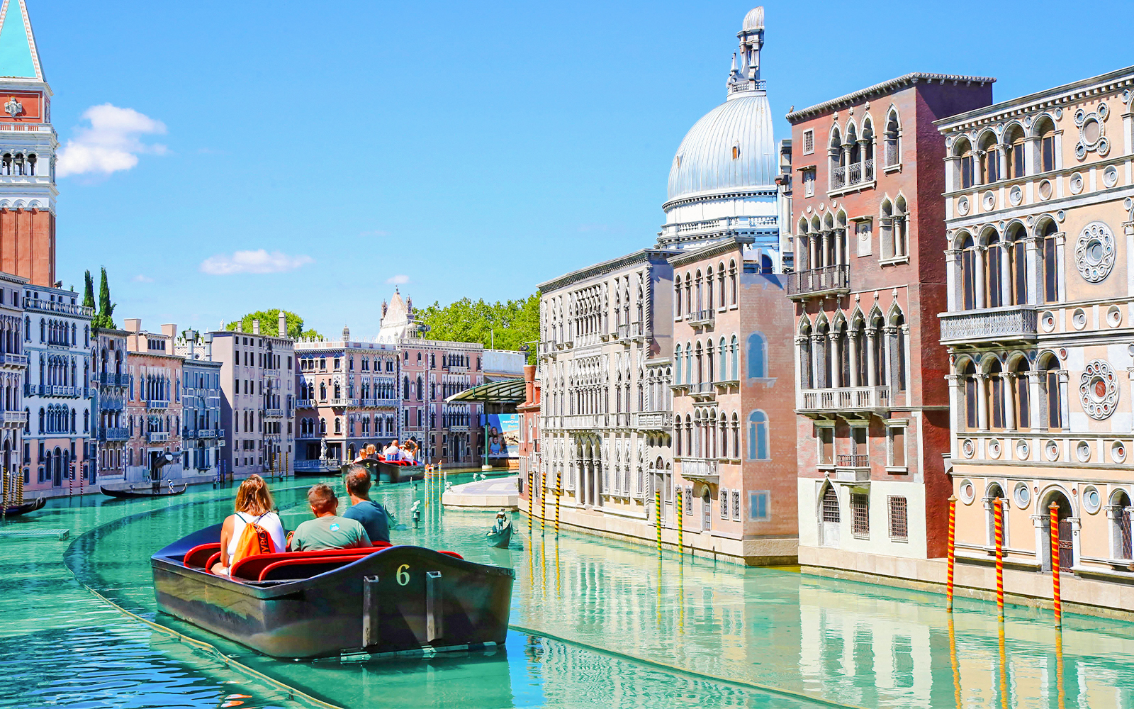 Boat ride through Venice replica at Italia in Miniatura, Italy.