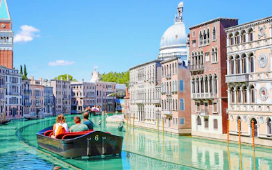 Boat ride through Venice replica at Italia in Miniatura, Italy.
