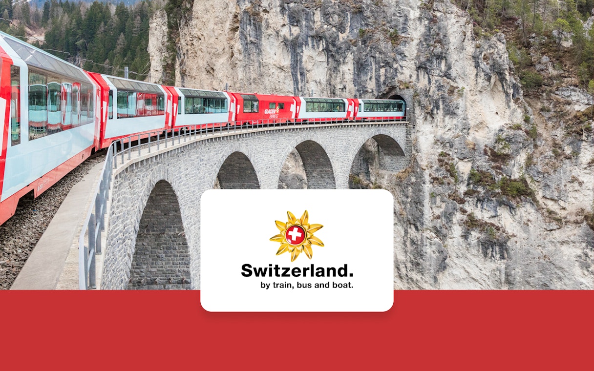 Train crossing the Landwasser Viaduct in Switzerland with Swiss rail pass.