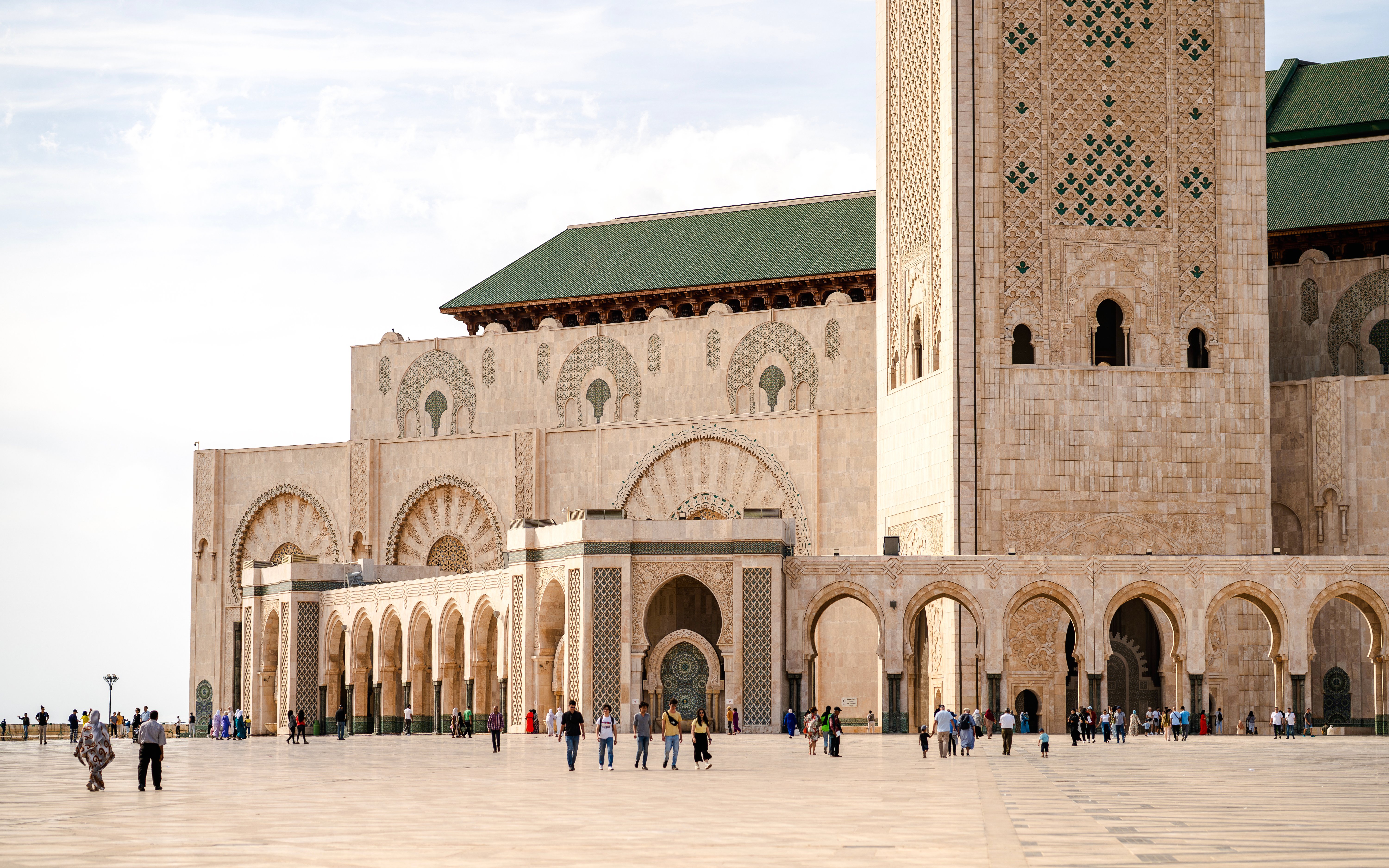 Hassan II Mosque exterior with arches and minaret, Casablanca.