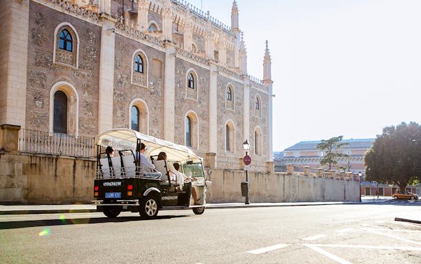 Eco Tuk Tuk tour in Lisbon passing by the iconic Belém Tower.