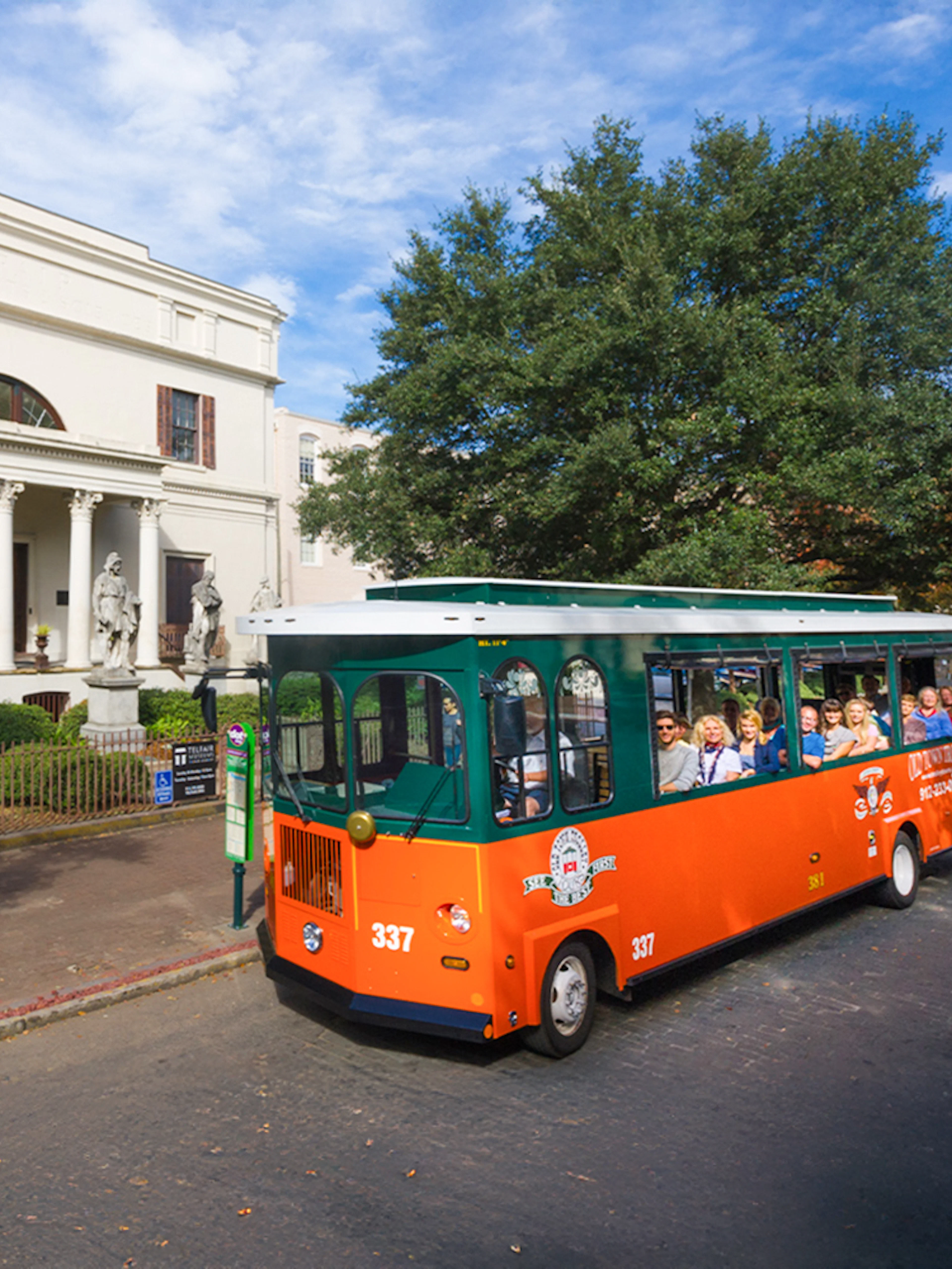 Savannah hop-on hop-off trolley passing Telfair Museum.